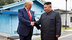 In this June 30, 2019, file photo, President Donald Trump shakes hands with North Korean leader Kim Jong Un in the Demilitarized Zone, South Korea.