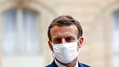 France's President Emmanuel Macron wears a mask during a speech of Estonia's Prime Minister Juri Ratas, at the Elysee Palace, in Paris