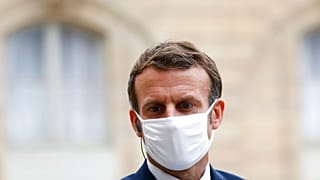 France's President Emmanuel Macron wears a mask during a speech of Estonia's Prime Minister Juri Ratas, at the Elysee Palace, in Paris