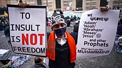 Members of an Italian Muslim association stage a sit-in and prayer to condemn what they see as persecutory acts against the Islamic community in France. Rome. October 30, 2020