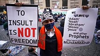 Members of an Italian Muslim association stage a sit-in and prayer to condemn what they see as persecutory acts against the Islamic community in France. Rome. October 30, 2020