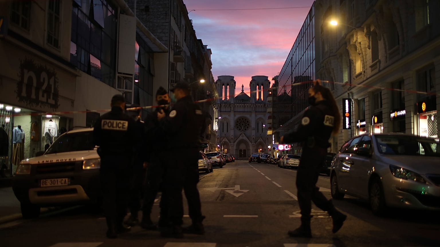 Police work behind a restricted zone near the Notre Dame church in Nice, southern France, after a knife attack took place on Thursday, Oct. 29, 2020. 