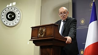 French Foreign Minister Jean-Yves Le Drian speaks during a joint news conference with Turkey's Foreign Minister Mevlut Cavusoglu, in Ankara, Turkey, Thursday, June 13, 2019