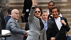 Johnny Depp was suing The Sun for an article that called the star a 'wife beater'
