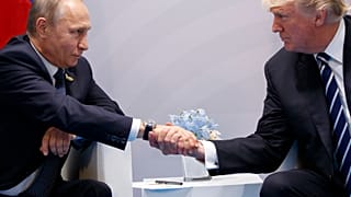 In this July 7, 2017, file photo, US President Donald Trump shakes hands with Russian President Vladimir Putin at the G20 Summit in Hamburg