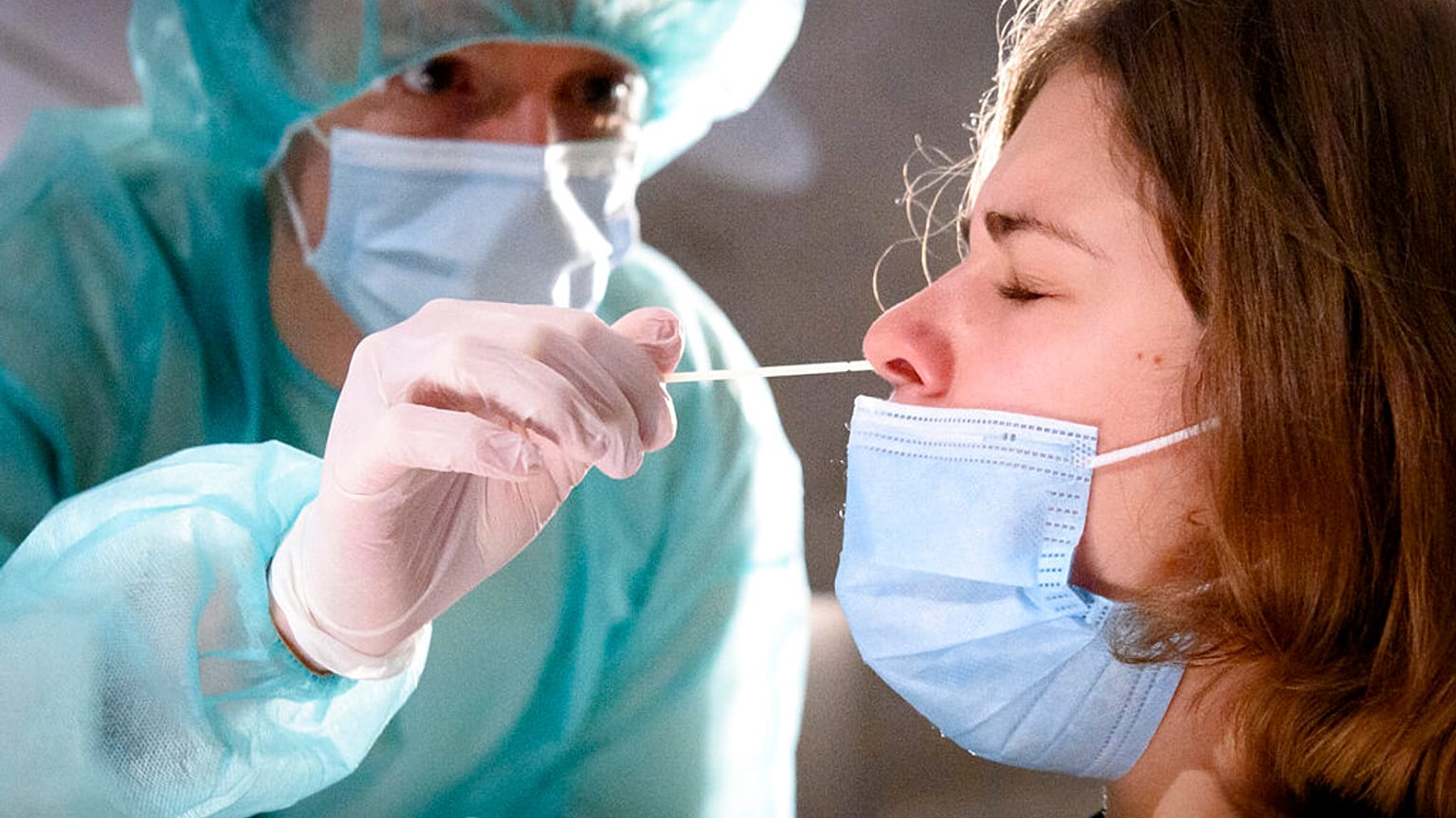 A health worker collects a nose swab sample for a polymerase chain reaction (PCR) test at the Mycorama coronavirus testing facility during the coronavirus disease (COVID-19) o