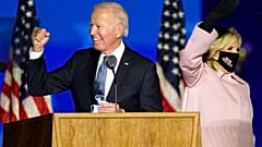 Joe Biden arrives with his wife Jill Biden to speak to supporters Wednesday, Nov. 4, 2020, in Wilmington, Del