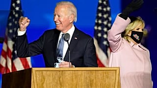 Joe Biden arrives with his wife Jill Biden to speak to supporters Wednesday, Nov. 4, 2020, in Wilmington, Del