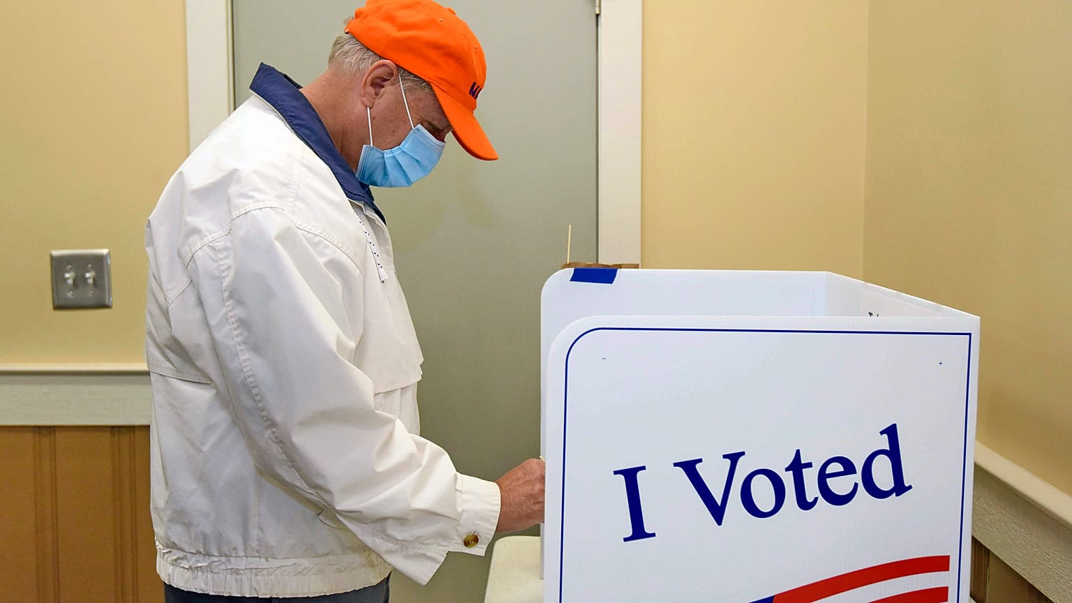 Republican U.S. Sen. Lindsey Graham marks his ballot electronically while voting in the general election in Seneca, South Carolina.