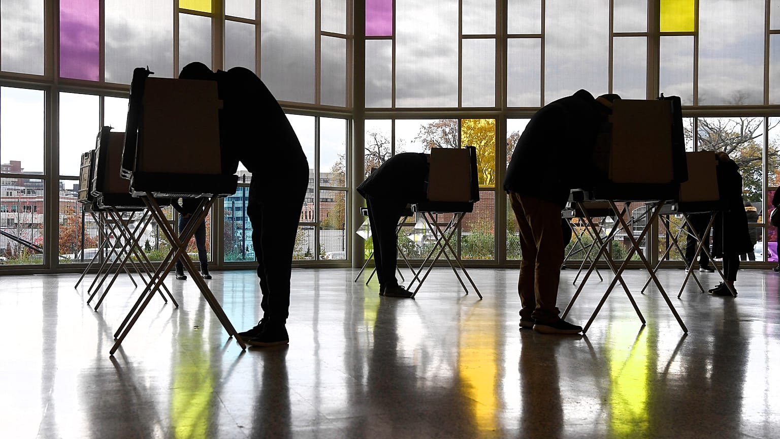 Voters mark their ballots at First Presbyterian Church on Election Day in Stamford, Connecticut