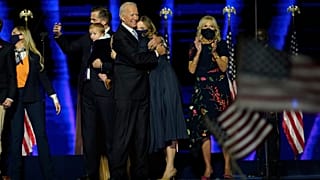 President-elect Joe Biden, center, with his wife Jill Biden and members of this family on stage, Saturday, Nov. 7, 2020, in Wilmington, Del.