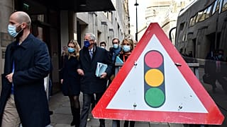 EU chief Brexit negotiator Michel Barnier, wearing an EU flag-themed facemask, in London on October 28, 2020 to attend the latest round of Brexit trade talks with the UK. 