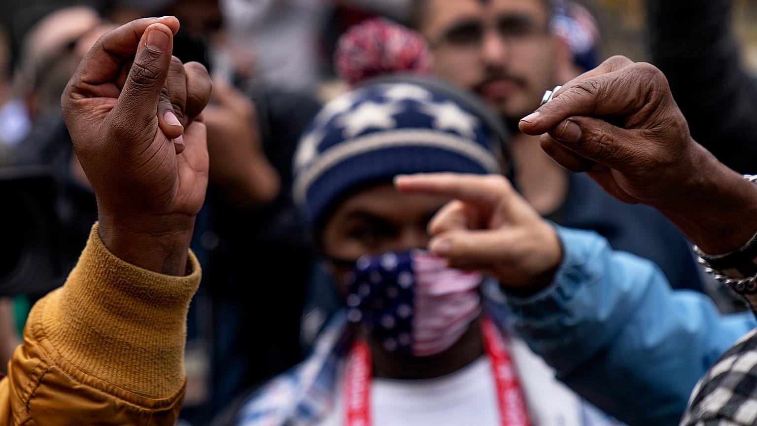 Supporters of Joe Biden and Donald Trump argue outside the central counting board in Detroit, Michigan on Thursday.