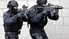 Police officers hold weapons during a training operation of the new BFE+ (Evidence and Arrestment) unit of the German federal police in Ahrensfelde near Berlin, Germany, Thurs