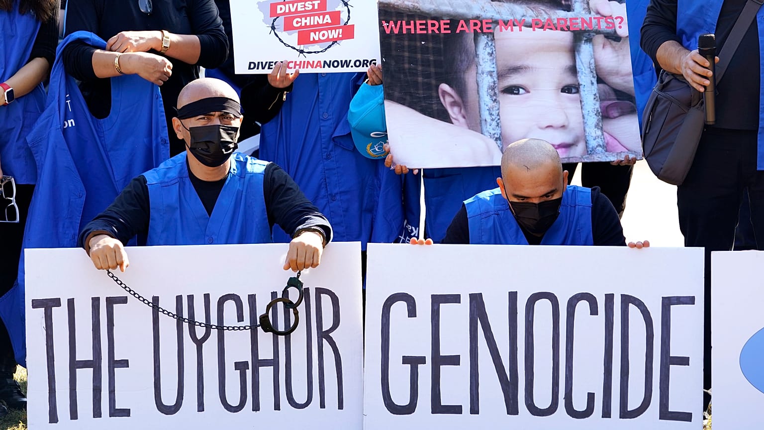 Members of the Uyghur American Association rally in front of the White House, Thursday, Oct. 1, 2020.