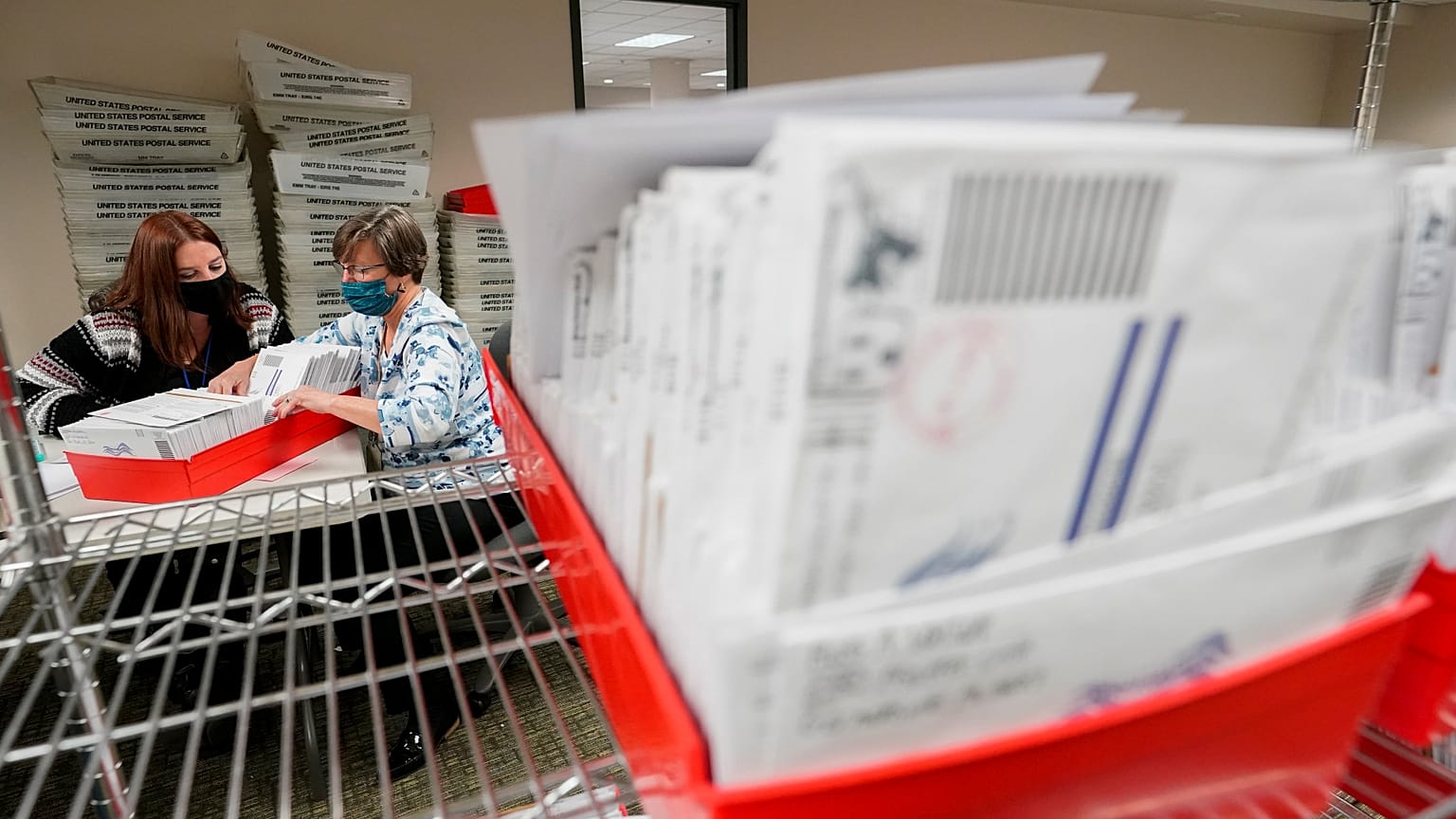Lehigh County workers count ballots as vote counting in the general election continues, Thursday, Nov. 5, 2020, in Allentown, Pa.