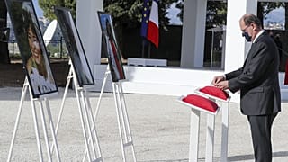 Jean Castex posthumously awards the victims of a knife attack during a ceremony in Nice, southern France, Saturday Nov. 7, 2020.