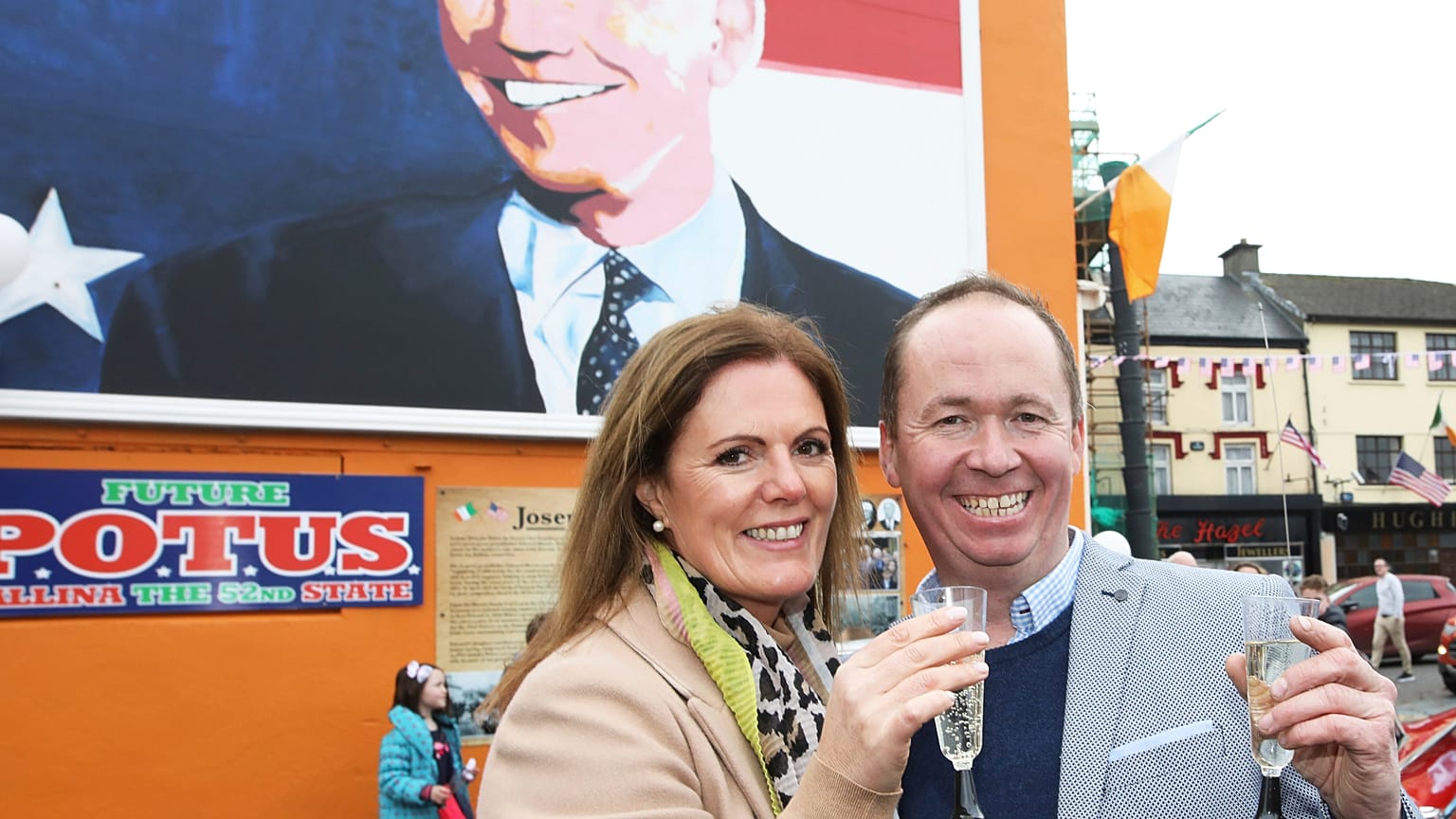 Joe Blewitt, a cousin of US Presidential candidate Joe Biden, and his wife Deirdre celebrate in anticipation of the results of the US election.