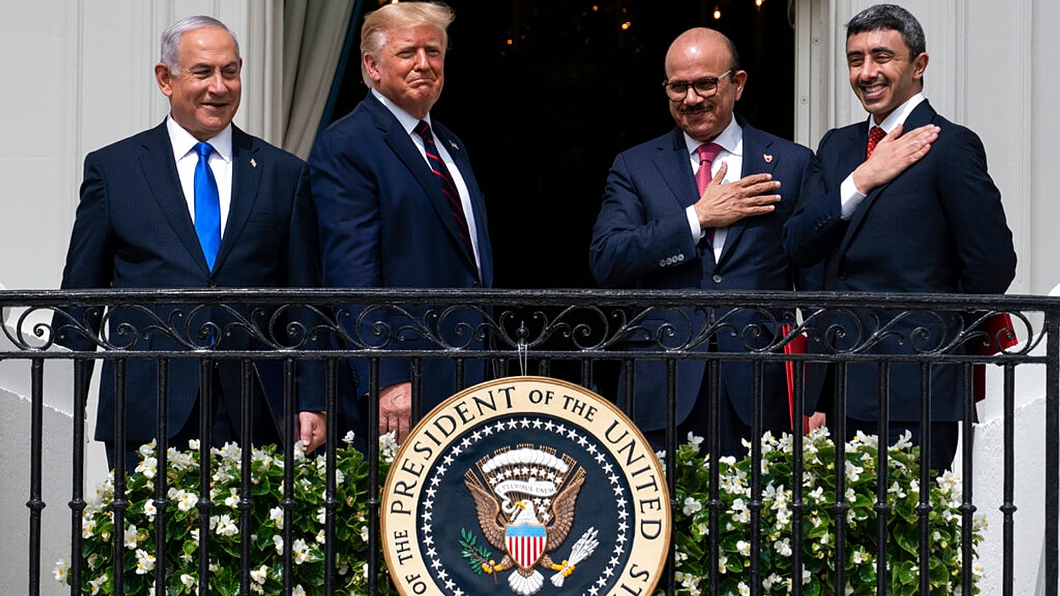 Israeli Prime Minister Benjamin Netanyahu, left, President Donald Trump, Bahrain's Khalid bin Ahmed Al Khalifa the UAE's Foreign Minister Abdullah Zayed al-Nahyan