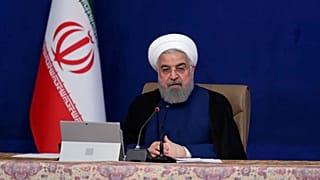 In this photo released by the official website of the office of the Iranian Presidency, President Hassan Rouhani speaks during a cabinet meeting in Tehran, Iran, Nov 4, 2020.