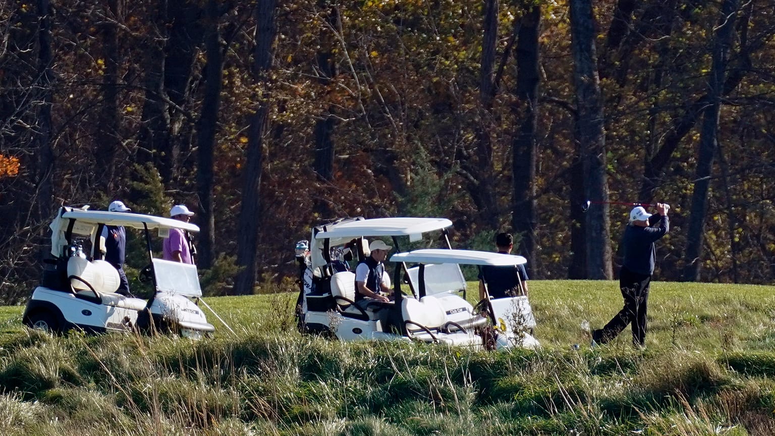 President Donald Trump participates in a round of golf at the Trump National Golf Course on Saturday, Nov. 7, 2020, in Sterling, Va. 