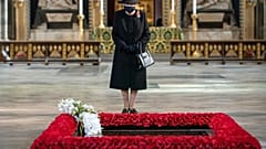 Britain's Queen Elizabeth II attends a ceremony to mark the centenary of the burial of the Unknown Warrior, in Westminster Abbey, London, Wednesday, Nov. 4, 2020