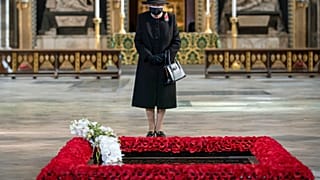 Britain's Queen Elizabeth II attends a ceremony to mark the centenary of the burial of the Unknown Warrior, in Westminster Abbey, London, Wednesday, Nov. 4, 2020