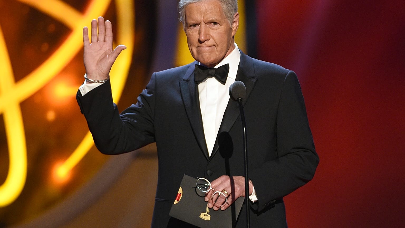 FILE - This May 5, 2019, file photo shows Alex Trebek gestures while presenting an award at the 46th annual Daytime Emmy Awards in Pasadena, Calif. 