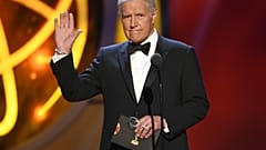 FILE - This May 5, 2019, file photo shows Alex Trebek gestures while presenting an award at the 46th annual Daytime Emmy Awards in Pasadena, Calif. 