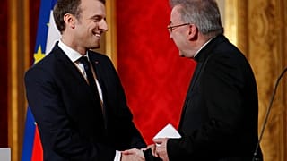 The Vatican's former ambassador to France went on trial for alleged sexual misconduct.