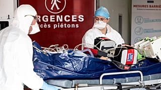 A COVID-19 patient is from another region to the Nouvel Hopital Civil of Strasbourg, Nov. 6, 2020.