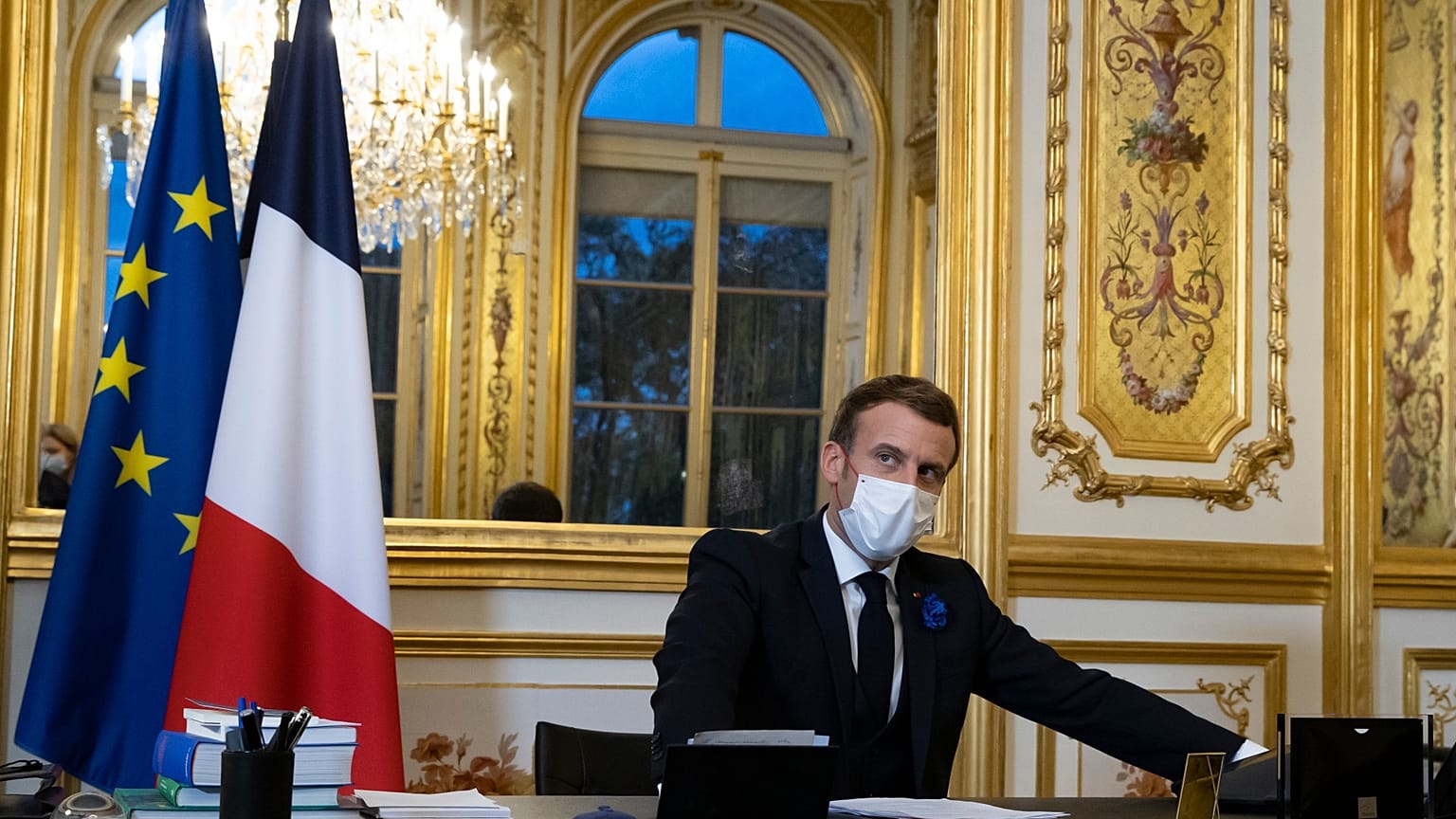 French President Emmanuel Macron speaks on the telephone to US President-elect Joe Biden, at the Elysee Palace in Paris, Tuesday, Nov. 10, 2020.