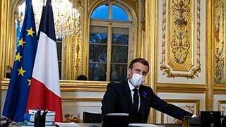 French President Emmanuel Macron speaks on the telephone to US President-elect Joe Biden, at the Elysee Palace in Paris, Tuesday, Nov. 10, 2020.