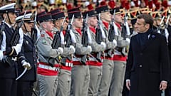 French President Emmanuel Macron reviews the troops as he inaugurates a memorial for soldiers fallen in foreign conflicts, Monday Nov. 11, 2019 in Paris.