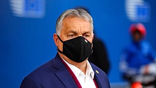 Hungary's Prime Minister Viktor Orban leaves the building during departures at the end of an EU summit in Brussels, Friday, Oct. 16