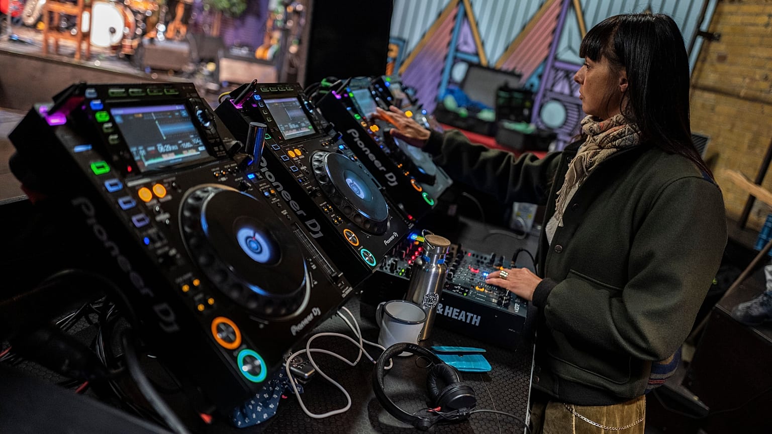 A DJ prepares her decks at a Berlin club back in March 2020