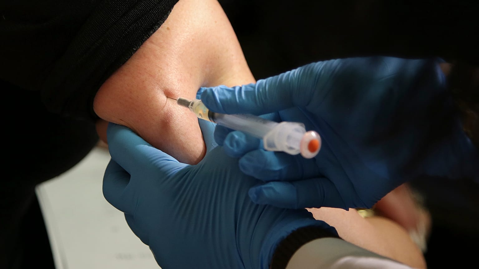 In this March 27, 2019 file photo, a woman receives a measles, mumps and rubella vaccine at the Rockland County Health Department in Pomona, N.Y.