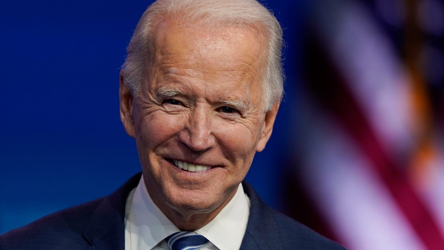 President-elect Joe Biden pauses as listens to media questions at The Queen theater, Tuesday, Nov. 10, 2020, in Wilmington, Del.