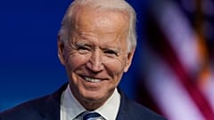 President-elect Joe Biden pauses as listens to media questions at The Queen theater, Tuesday, Nov. 10, 2020, in Wilmington, Del.