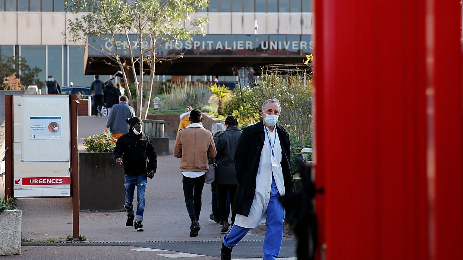 Dr Philippe Montravers arrives at the Bichat Hospital in Paris, Nov. 10, 2020. Montravers and the 150 doctors and nurses he leads have become experts on treating COVID-19.