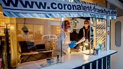 Dr Georg Siemon offers COVID tests with a result in 20 minutes from a kiosk given up by its owners due to the pandemic, Frankfurt, Germany, Wednesday, Nov. 11, 2020.