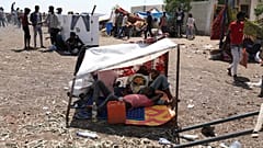 Refugees from Ethiopia's Tigray region at the UNCHR center at Hamdayet, Sudan, Nov. 14, 2020. Tigray's regional government has fired rockets at the neighboring Amhara region.