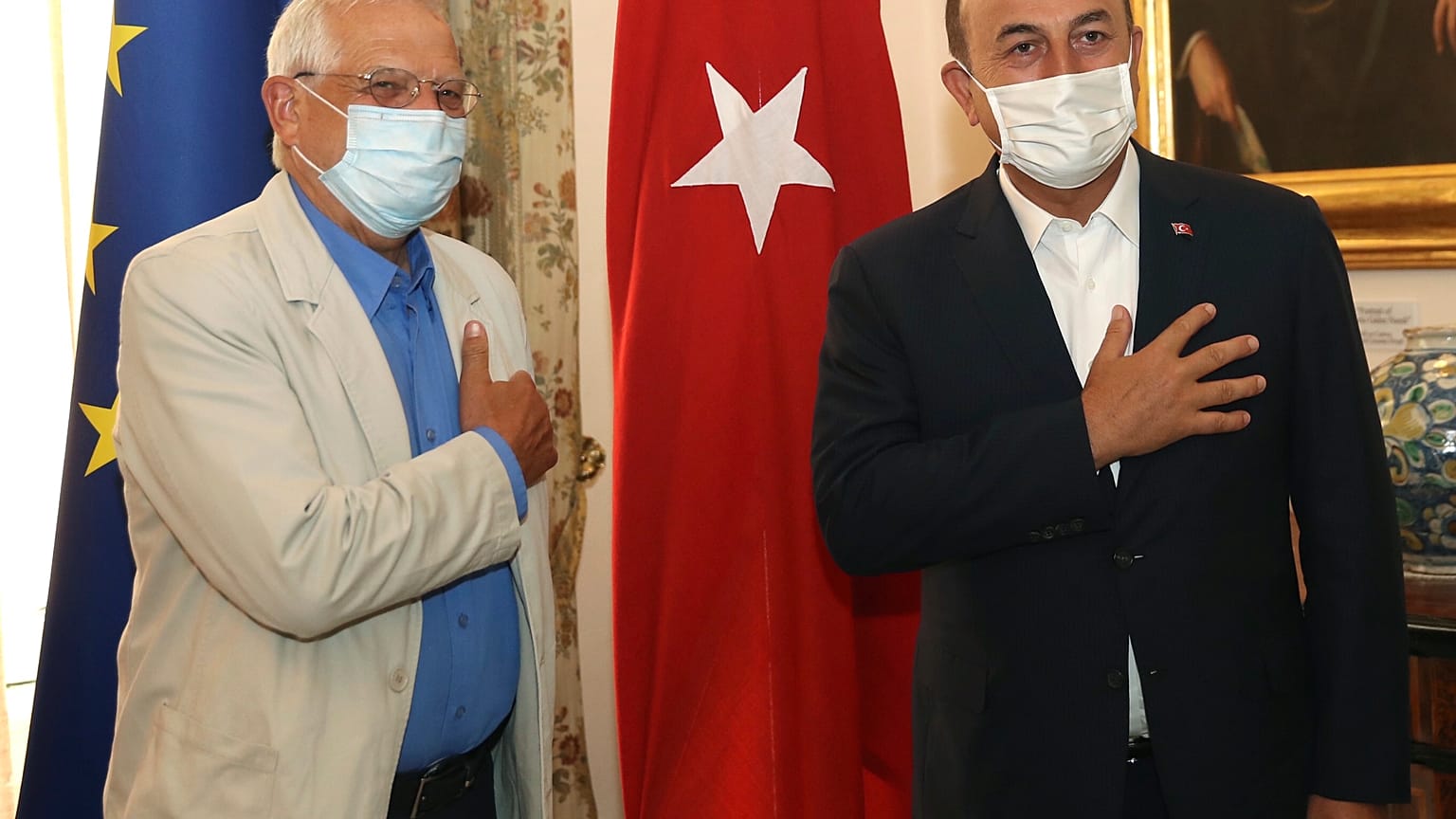 Turkey's Foreign Minister Mevlut Cavusoglu, right, and Josep Borrell Fontelles, High Representative and Vice-President of the European Commission