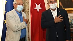 Turkey's Foreign Minister Mevlut Cavusoglu, right, and Josep Borrell Fontelles, High Representative and Vice-President of the European Commission