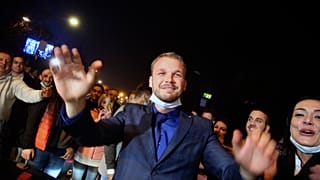 Drasko Stanivukovic from the Party of Democratic Progress (PDP) celebrates his victory in Banja Luka.