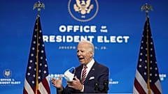President-elect Joe Biden, accompanied by Vice President-elect Kamala Harris, speaks about economic recovery at The Queen theater, Monday, Nov. 16, 2020, in Wilmington, Del.