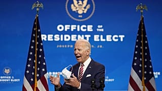 President-elect Joe Biden, accompanied by Vice President-elect Kamala Harris, speaks about economic recovery at The Queen theater, Monday, Nov. 16, 2020, in Wilmington, Del.