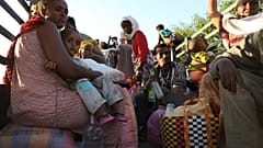 Ethiopian refugees gather in Qadarif region, easter Sudan, Tuesday, Nov. 17, 2020. 