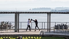 A personal training session overlooking Lake Constance at the Buchinger Wilhelmi resort, Germany.