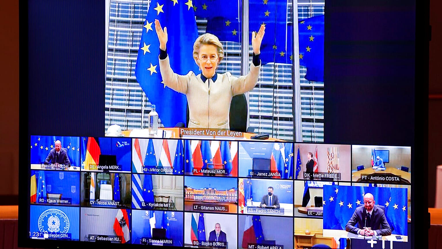 European Commission President Ursula von der Leyen, top, gestures as she talks with EU leaders during an EU Summit video conference at the European Council building.